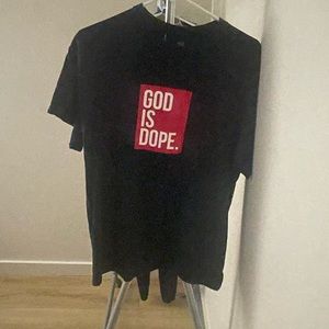 Unisex god is dope t shirt with #23 GOAT on the back size Large
